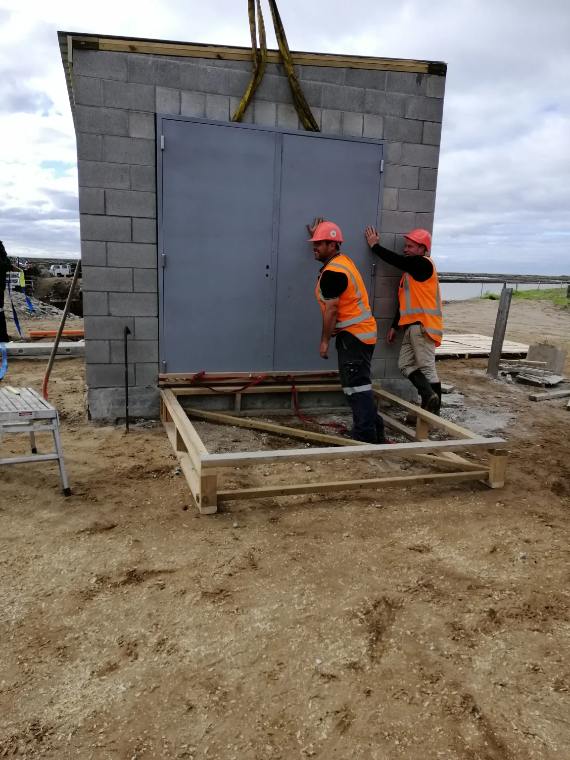 pump shed door installation- SGBuilders